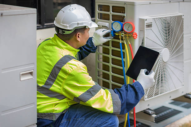 Professional Air Duct Cleaning technician working in Centreville, VA